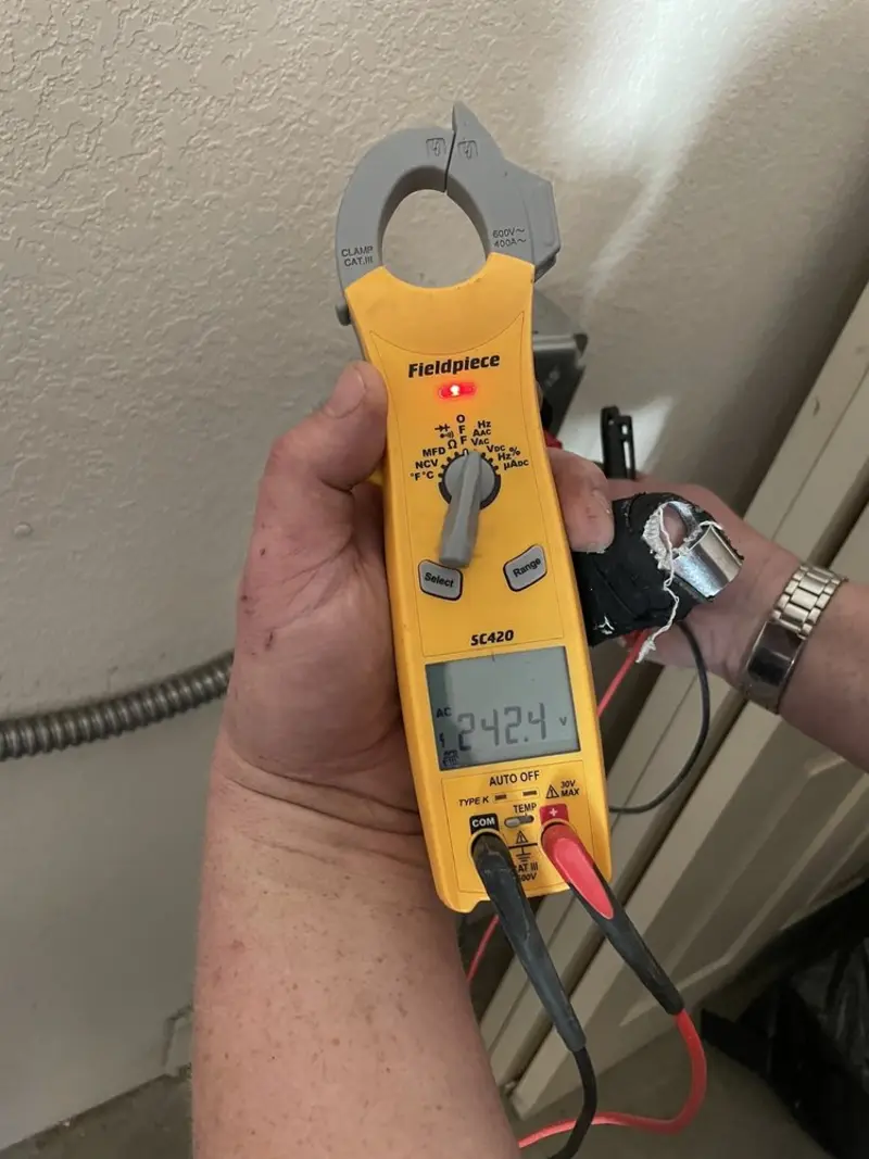 Voltage testing with clamp meter during Generator Installation in East Brunswick